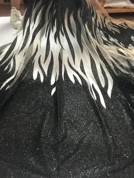 unique JIANXI.C-8511 embroidery net lace fabric French net lace fabric with glued glitter decoration
unique JIANXI.C-8511 embroidery net lace fabric French net lace fabric with glued glitter decoration