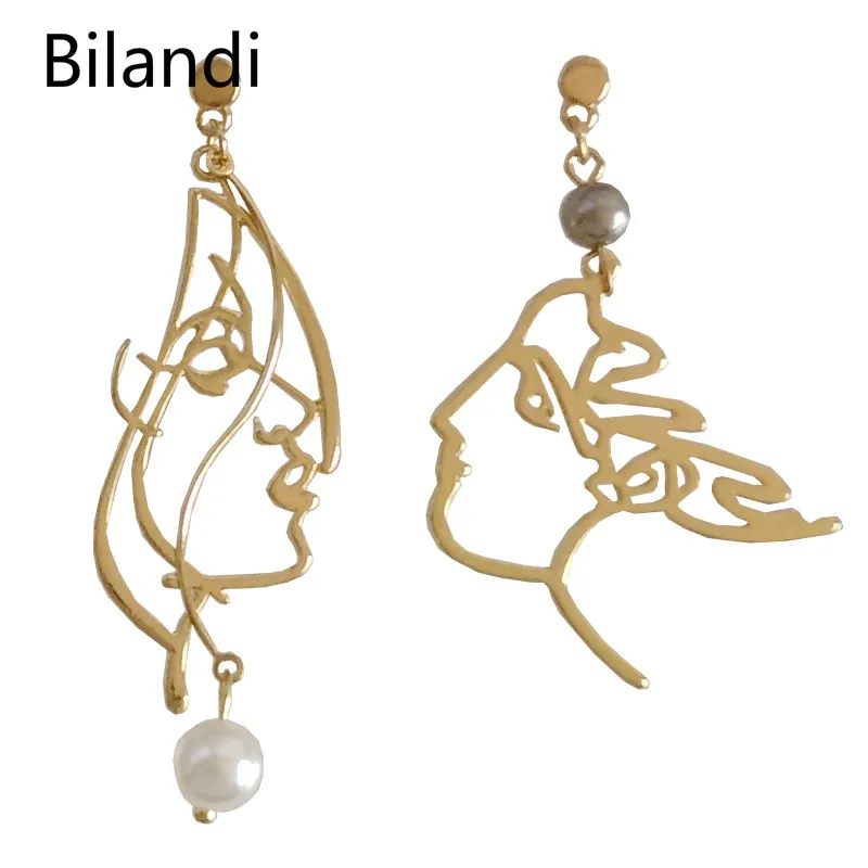 European And American Fashion Metal Personality Irregular Shape Earrings Simple Couple Character Face Earrings
European And American Fashion Metal Personality Irregular Shape Earrings Simple Couple Character Face Earrings