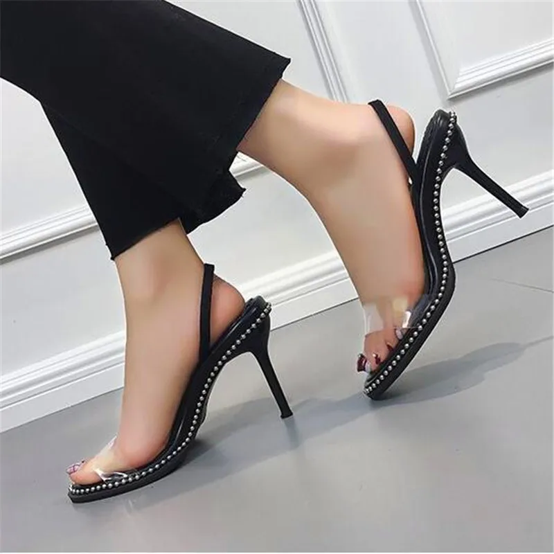 Summer super high-heeled women's fashion PVC ladies word with increased beaded women's sandals
Summer super high-heeled women's fashion PVC ladies word with increased beaded women's sandals
