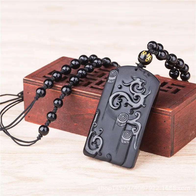 A genuine natural Matte Black Obsidian Dragon Pendant auspicious All is well. male and female Zhaocai transport
A genuine natural Matte Black Obsidian Dragon Pendant auspicious All is well. male and female Zhaocai transport