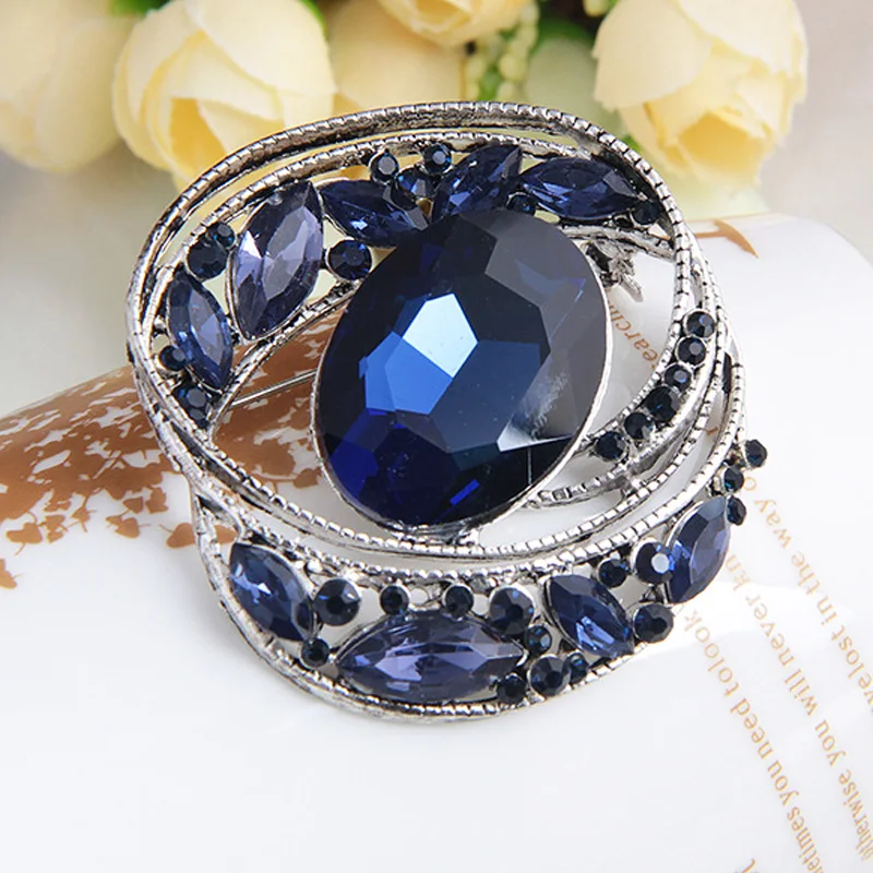 LUBOV Big Round Blue Crystal Stone Inlaid Hollow Silver Plated Metal Brooch Pin Luxury Women Costume Brooch Party Jewelry
LUBOV Big Round Blue Crystal Stone Inlaid Hollow Silver Plated Metal Brooch Pin Luxury Women Costume Brooch Party Jewelry