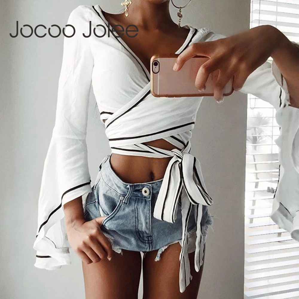 Jocoo Jolee Sexy Deep V-Neck Women Tops with Flare Long Sleeves Design Women Summer Lace up Street Wearings 2018 New Arrivals
Jocoo Jolee Sexy Deep V-Neck Women Tops with Flare Long Sleeves Design Women Summer Lace up Street Wearings 2018 New Arrivals