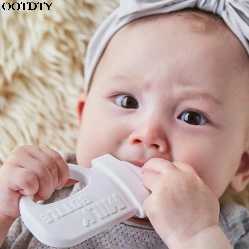 Silicone Baby Teether Small Milk Bottle Modeling Infant Molar Stick Pacifier Supplies Toys
Silicone Baby Teether Small Milk Bottle Modeling Infant Molar Stick Pacifier Supplies Toys