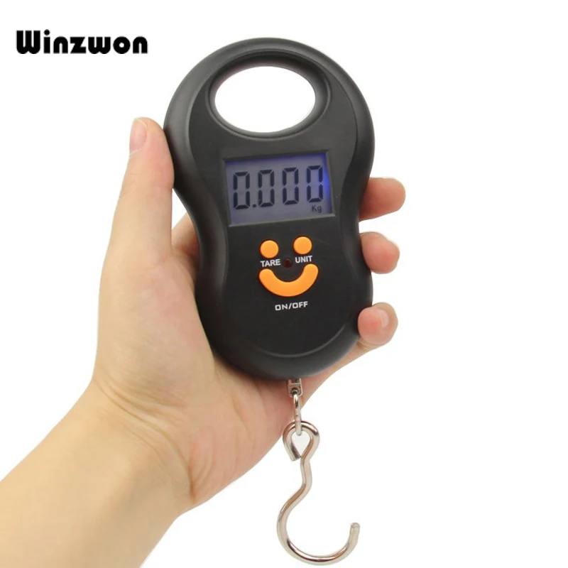 50kg/10g Portable Handle Smile Face Design Luggage Scales Digital Scale Electronic Weight Scale With LCD Display Hanging Hook
50kg/10g Portable Handle Smile Face Design Luggage Scales Digital Scale Electronic Weight Scale With LCD Display Hanging Hook