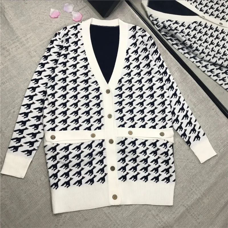 High Quality 50% Wool Sweater for Women Winter V Neck Houndstooth Black White Jacquard Button Warm Loose Knitted Cardigans
High Quality 50% Wool Sweater for Women Winter V Neck Houndstooth Black White Jacquard Button Warm Loose Knitted Cardigans
