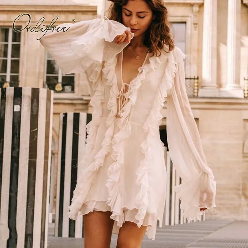 Ordifree 2019 Summer Women White Beach Dress Long Sleeve Bohomian Lace Up Ruffle Sexy Transparent Short Mini Dress
Ordifree 2019 Summer Women White Beach Dress Long Sleeve Bohomian Lace Up Ruffle Sexy Transparent Short Mini Dress
