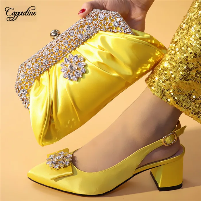 Charming wedding/party yellow high heel buckle shoes and party handbag set nice matchinf for lady dress A562, heel height 6.4cm
Charming wedding/party yellow high heel buckle shoes and party handbag set nice matchinf for lady dress A562, heel height 6.4cm