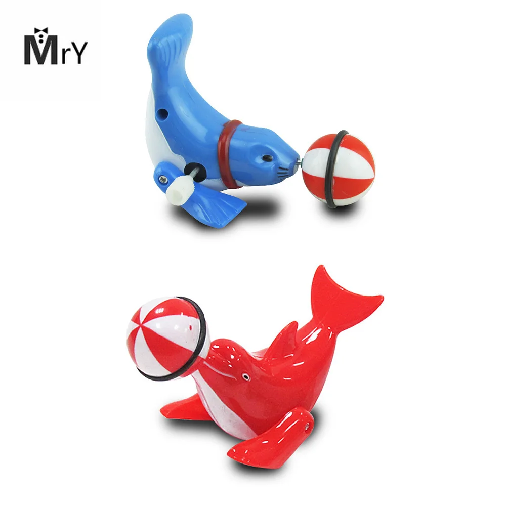 

MrY 2019 new Children's Wind-up Toy Dolphin Top Ball 360 Degree Rotation Fun Dolphins Modelling Clockwork Toy vintage toys