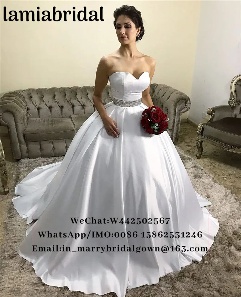 Vestido De Novia Princess Ball Gown Wedding Dresses 2019 Sweetheart Crystals Sash Plus Size Cheap Satin White Bridal Gowns
Vestido De Novia Princess Ball Gown Wedding Dresses 2019 Sweetheart Crystals Sash Plus Size Cheap Satin White Bridal Gowns