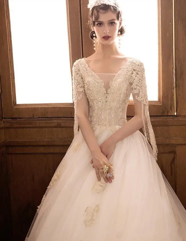 short-sleeve-royal-princess-wedding-dresses-a-line-gold-appliques-tulle-bridal-gown-crystal-beading-court-train-bridal-dress-custom-made (1)