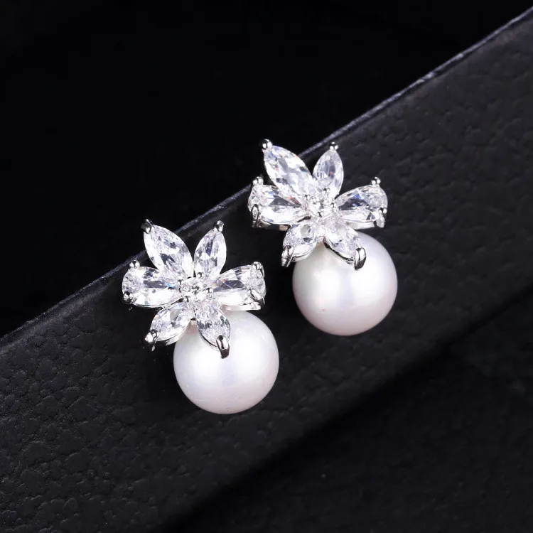 Luxury Fashion Small Flower Stud Earrings Cute Silver Color Wedding Pearl Earrings Boho Double Zircon Stone Earrings For Women
Luxury Fashion Small Flower Stud Earrings Cute Silver Color Wedding Pearl Earrings Boho Double Zircon Stone Earrings For Women