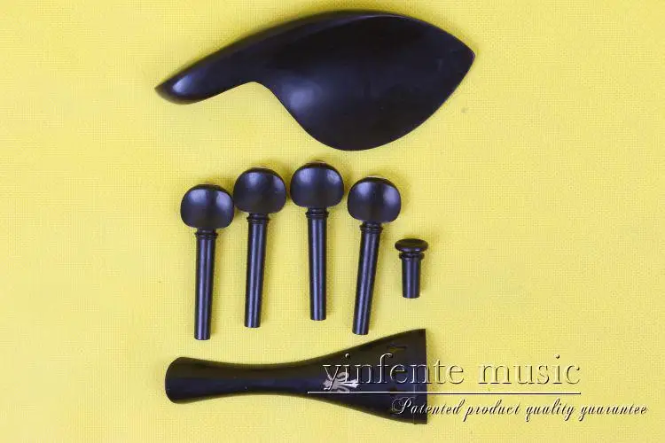 

4 string violin partsNew 1 set 1set Brand new natural ebony 4/4 violin parts peg tailpiece chinrest endpin