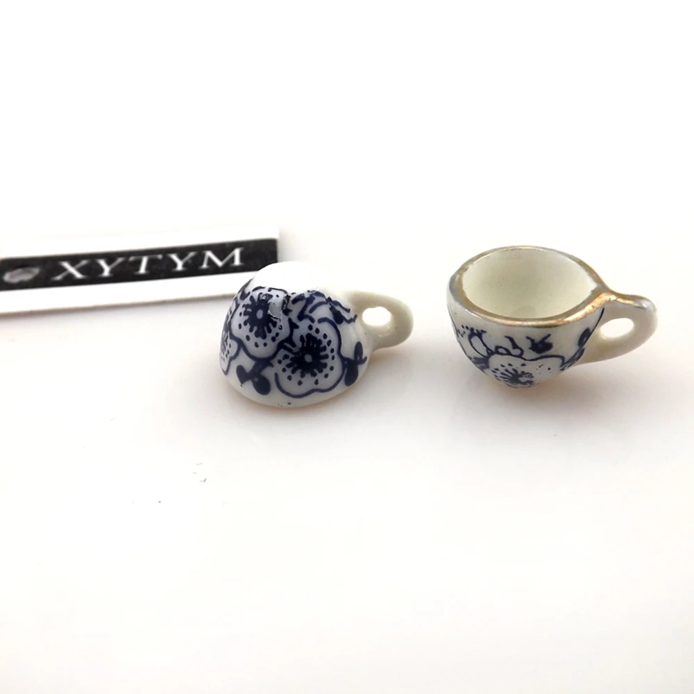50pcs/lot Blue Flower Printed Antique Chinese Style Teacup Pendants 16x11x9mm Ceramic Charms For DIY
50pcs/lot Blue Flower Printed Antique Chinese Style Teacup Pendants 16x11x9mm Ceramic Charms For DIY