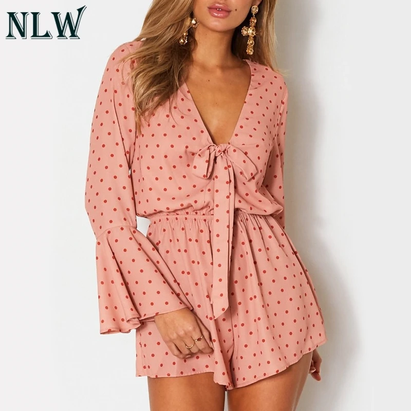 

NLW 2019 Summer Polka Dot Lace up Jumpsuit Women 2018 Fashion Playsuit Flare Sleeve V Neck Sexy Casual Bow Playsuit Short Romper