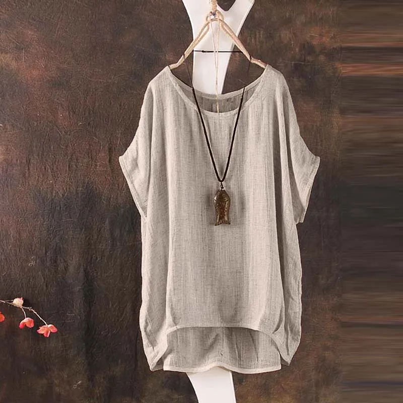 Cotton and linen loose shirt bat sleeves Summer women solid color casual round neck polyester hem irregular Blouse
Cotton and linen loose shirt bat sleeves Summer women solid color casual round neck polyester hem irregular Blouse