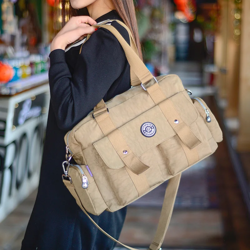 2019 Brand Solid Multi pockets Women Handbags Nylon Lady Shoulder Bags Multifunctional Waterproof Nylon Travel Messenger Bags
2019 Brand Solid Multi pockets Women Handbags Nylon Lady Shoulder Bags Multifunctional Waterproof Nylon Travel Messenger Bags