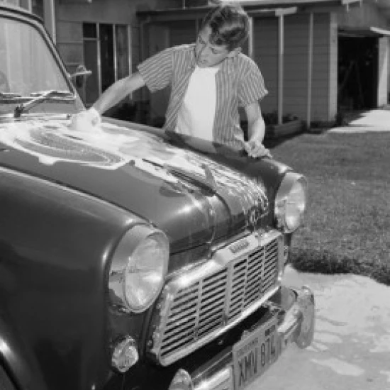 Boy washing car Poster Print (18 x 24)