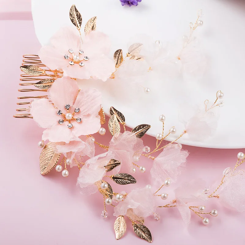 pink fabric leaf new bride hair comb handmade flowers wedding hair jewelry accessories wholesale manufacturers
pink fabric leaf new bride hair comb handmade flowers wedding hair jewelry accessories wholesale manufacturers