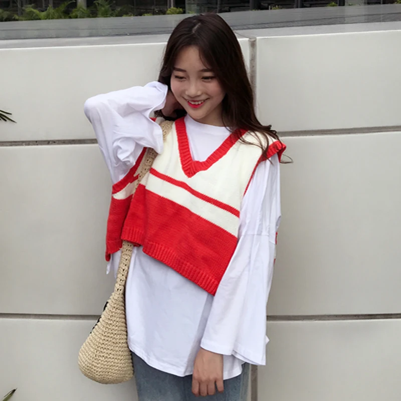 Women Autumn V Neck Knitted Sweater Female Sleeveless High and Low Vest Sweater 2019 Womens Contrast Color Tops Sweater
Women Autumn V Neck Knitted Sweater Female Sleeveless High and Low Vest Sweater 2019 Womens Contrast Color Tops Sweater