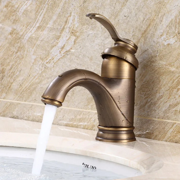 UK style Antique brass finishing basin faucets single hand hot and cold washbasin Mixer tap torneira banheiro
UK style Antique brass finishing basin faucets single hand hot and cold washbasin Mixer tap torneira banheiro