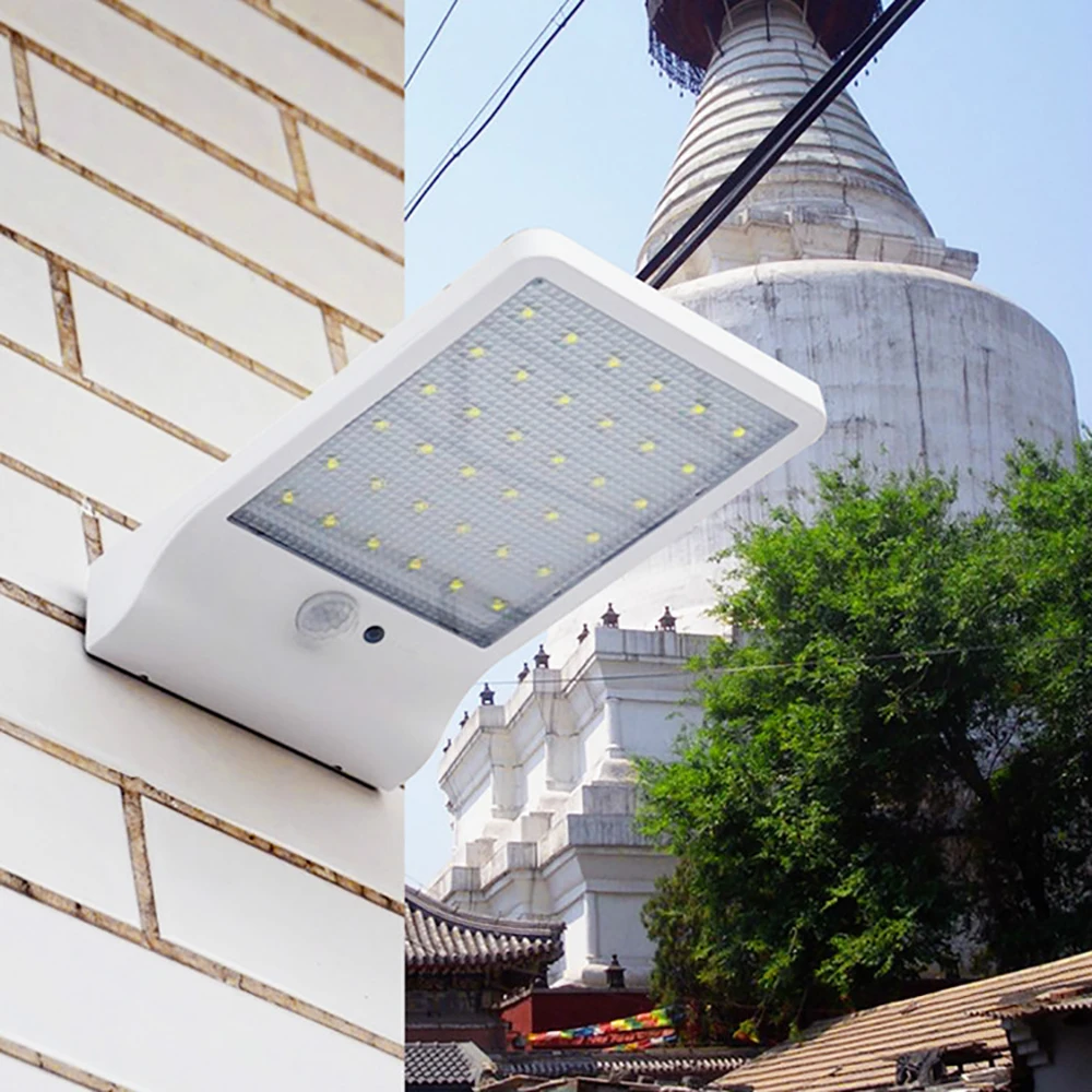 Фото Уличная светодиодная настенная лампа на солнечной батарее водонепроницаемый