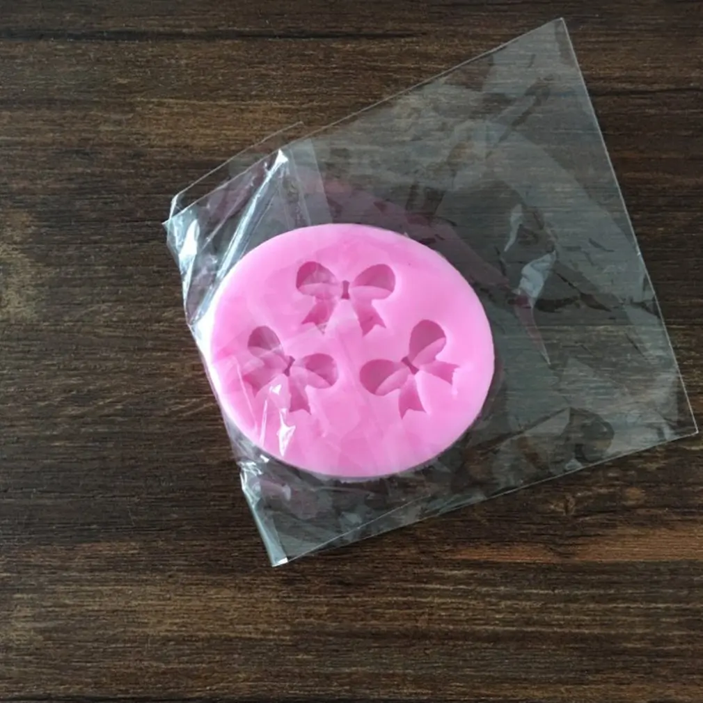 DIY Silicone Cake Mold Bow Candy Cake Decorations Ribbon Mold Chocolate Jewelry Mold with 3 Small Bow Cavities
DIY Silicone Cake Mold Bow Candy Cake Decorations Ribbon Mold Chocolate Jewelry Mold with 3 Small Bow Cavities