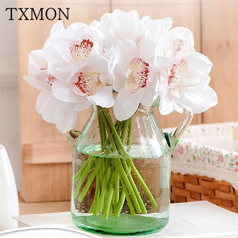 High grade simulation 6 head feels Cymbidium bouquet artificial fake flower home living room Table Wedding decoration flowers
High grade simulation 6 head feels Cymbidium bouquet artificial fake flower home living room Table Wedding decoration flowers