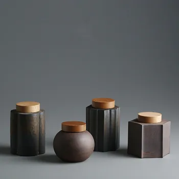 Sealed tea cans gray enamel gold glaze ceramic tea box Pu'er tea warehouse wake up teapot wooden cover pot
Sealed tea cans gray enamel gold glaze ceramic tea box Pu'er tea warehouse wake up teapot wooden cover pot