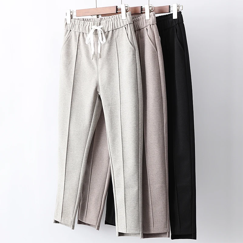 Woman autumn winter woolen harem pants elastic waist drawstring tie high waist casual pencil pants woolen feet pants trousers
Woman autumn winter woolen harem pants elastic waist drawstring tie high waist casual pencil pants woolen feet pants trousers