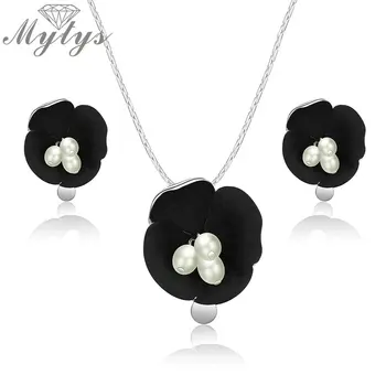 Mytys Women Trendy Fashion Black Flower Jewelry Sets White Pearls Stamen Shining Silver Chain Pendant Necklace Earrings CN444
Mytys Women Trendy Fashion Black Flower Jewelry Sets White Pearls Stamen Shining Silver Chain Pendant Necklace Earrings CN444