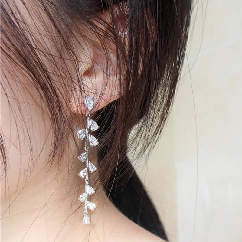 Elegant 925 Sterling Silver Micro Pave Zirconia Crystal Leaf Long Drop Earrings for Women Bridal Wedding Jewelry Accessories
Elegant 925 Sterling Silver Micro Pave Zirconia Crystal Leaf Long Drop Earrings for Women Bridal Wedding Jewelry Accessories