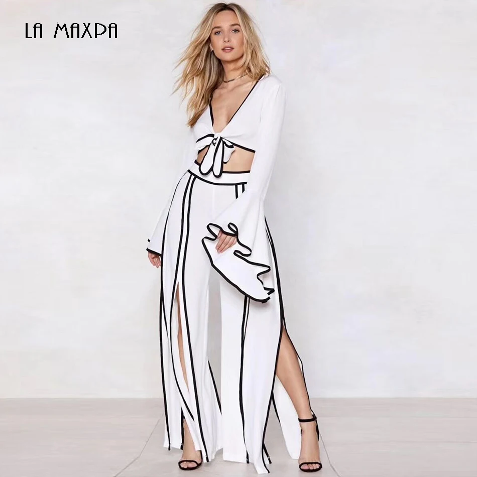 2019 new split sexy white two-piece women's clothing long-sleeved shirt & wide-leg pants 2 sets of fashion casual party
2019 new split sexy white two-piece women's clothing long-sleeved shirt & wide-leg pants 2 sets of fashion casual party