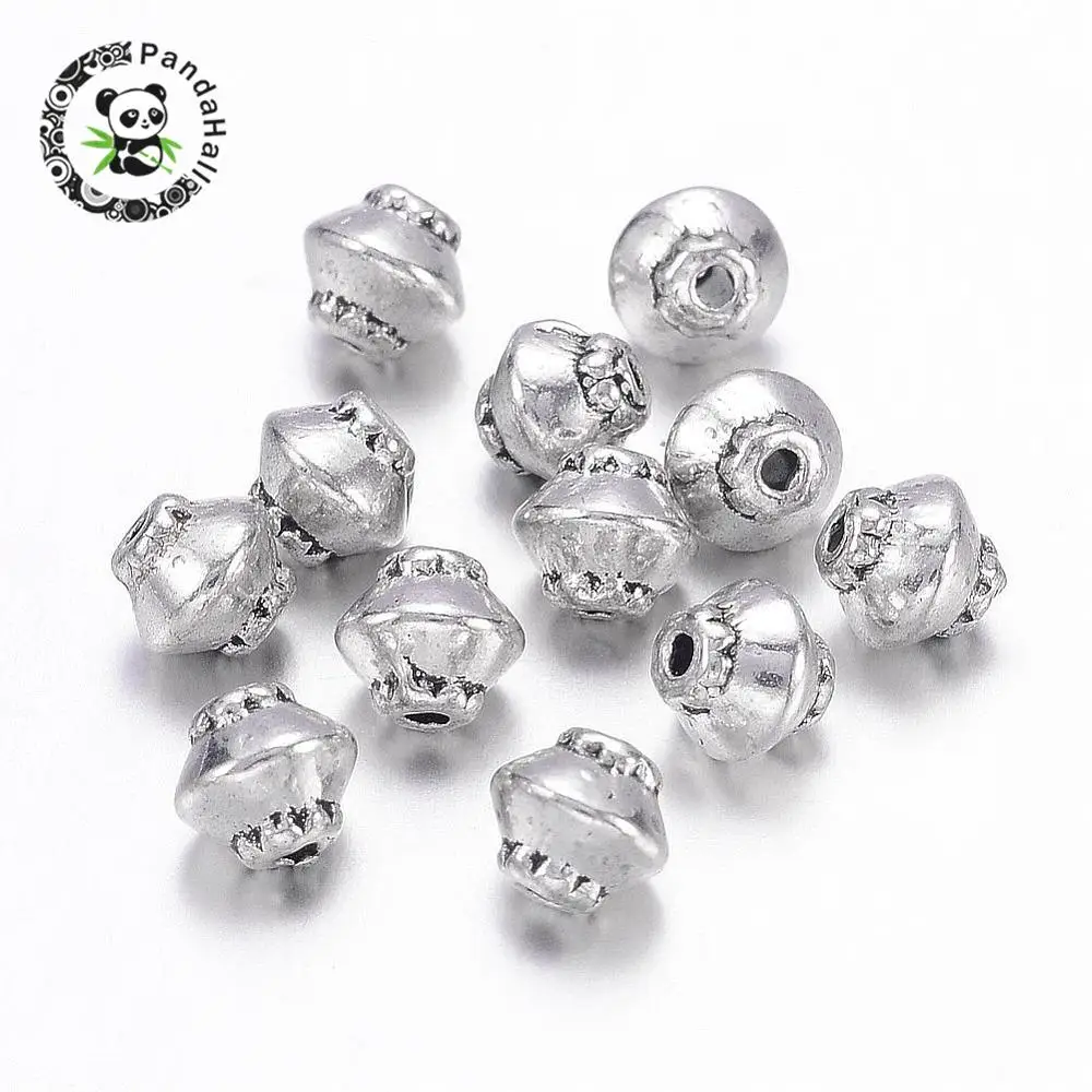 Tibetan Style Bead Spacers, Lead Free & Nickel Free & Cadmium Free, Bicone, Antique Silver, about 5mm in diameter, 4.5mm thick,
Tibetan Style Bead Spacers, Lead Free & Nickel Free & Cadmium Free, Bicone, Antique Silver, about 5mm in diameter, 4.5mm thick,