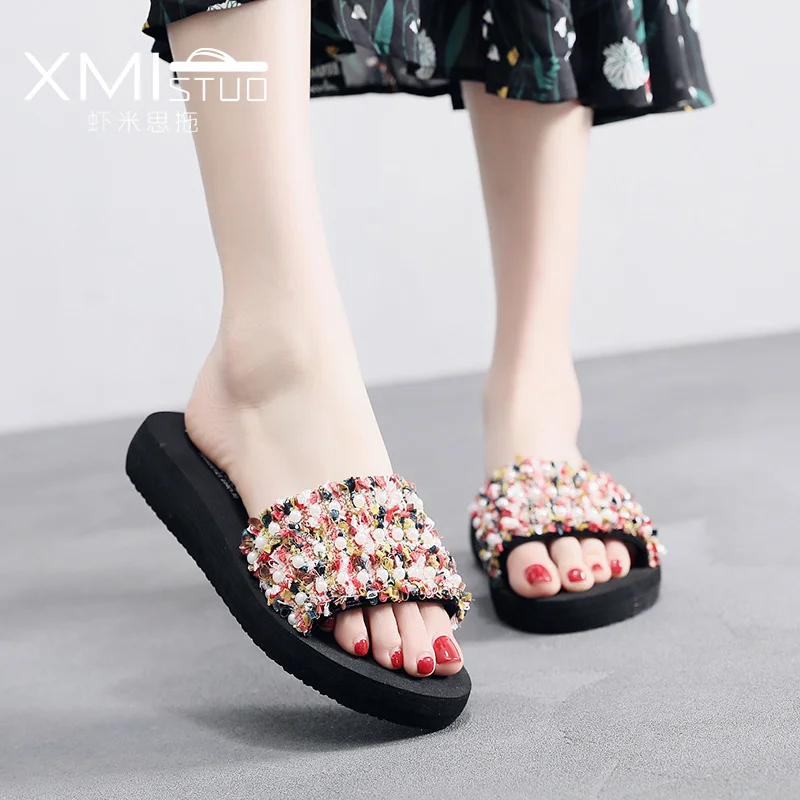 Fashion casual elegant slippers female summer wear beach holiday seaside word drag flat bottom non-slip large size net red sanda
Fashion casual elegant slippers female summer wear beach holiday seaside word drag flat bottom non-slip large size net red sanda