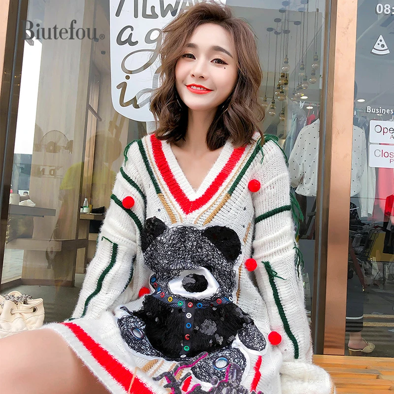 2020 New Arrival Autumn and Winter Women Long Fashion Sequined Cartoon Pattern Knitted V Neck Dresses
2020 New Arrival Autumn and Winter Women Long Fashion Sequined Cartoon Pattern Knitted V Neck Dresses