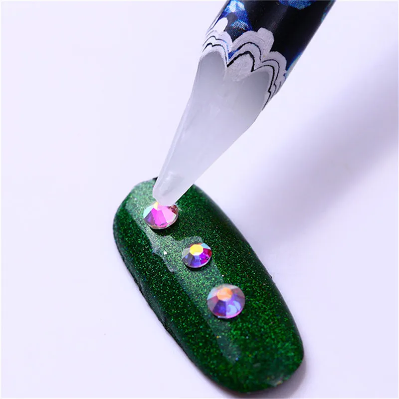 1Pc Wax Pen Rhinestone Picker Dotting Pen Easily Picking Up Manicure Rhinestones Studs 3D Nail Decoration Picker Nail Art Tools
1Pc Wax Pen Rhinestone Picker Dotting Pen Easily Picking Up Manicure Rhinestones Studs 3D Nail Decoration Picker Nail Art Tools