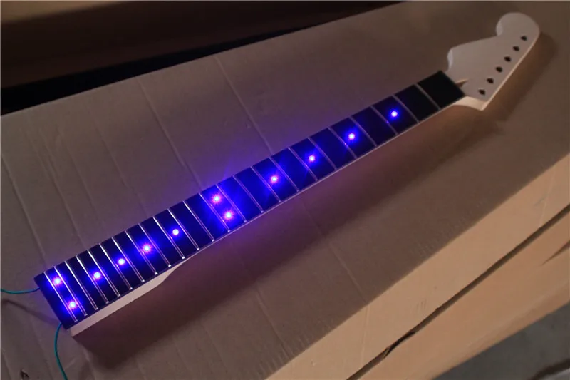Factory Wholesale 24 Frets Rosewood Fretboard Reverse Headstock Electric Guitar Neck with Blue Lights,Offer Customized
Factory Wholesale 24 Frets Rosewood Fretboard Reverse Headstock Electric Guitar Neck with Blue Lights,Offer Customized