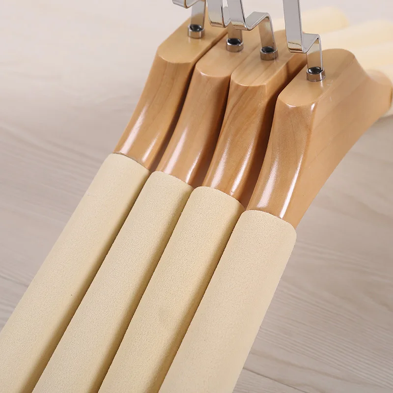 Bold Solid Wood Sponge Non-slip Seamless Home Coat Hanger Clothing Store Clothes Hanging Clothes Sweater Hanger 030
Bold Solid Wood Sponge Non-slip Seamless Home Coat Hanger Clothing Store Clothes Hanging Clothes Sweater Hanger 030