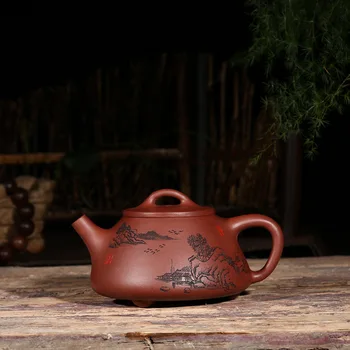 Yixing Famous Manual Dark-red Enameled Pottery Teapot Raw Ore Zini Mountain Scenery You Smelting Stone Drum Teapot
Yixing Famous Manual Dark-red Enameled Pottery Teapot Raw Ore Zini Mountain Scenery You Smelting Stone Drum Teapot