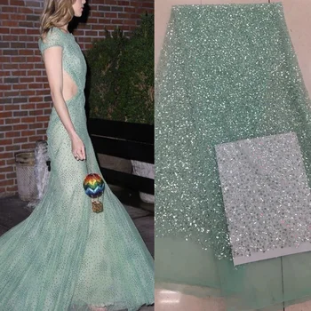 5 color high quality French net lace fabric mint green tulle lace fabric with allover sequins and small beads for dress SQXS017
5 color high quality French net lace fabric mint green tulle lace fabric with allover sequins and small beads for dress SQXS017