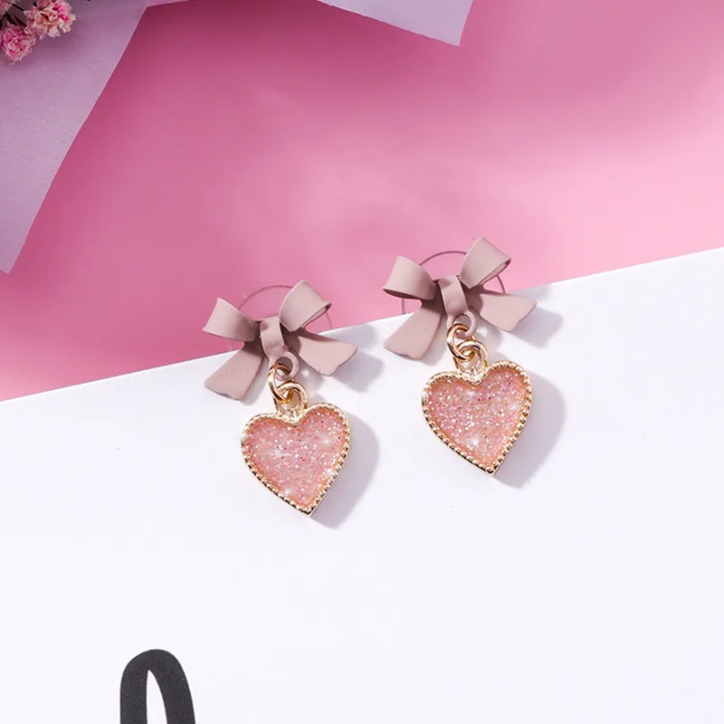 Modern Women's Earrings 2018 Painted Bow-knot Shining Heart Women Stud Earrings Korean Fashion Cute Female Jewelry Accessories
Modern Women's Earrings 2018 Painted Bow-knot Shining Heart Women Stud Earrings Korean Fashion Cute Female Jewelry Accessories