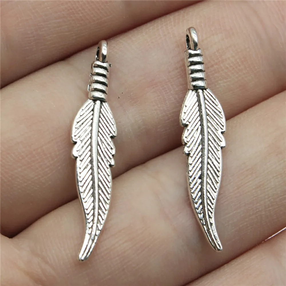 Charms Feather Antique Silver Color Alloy Diy Jewelry Making Accessories 1.3x0.2 inch (32x6mm) 40pcs/lot
Charms Feather Antique Silver Color Alloy Diy Jewelry Making Accessories 1.3x0.2 inch (32x6mm) 40pcs/lot