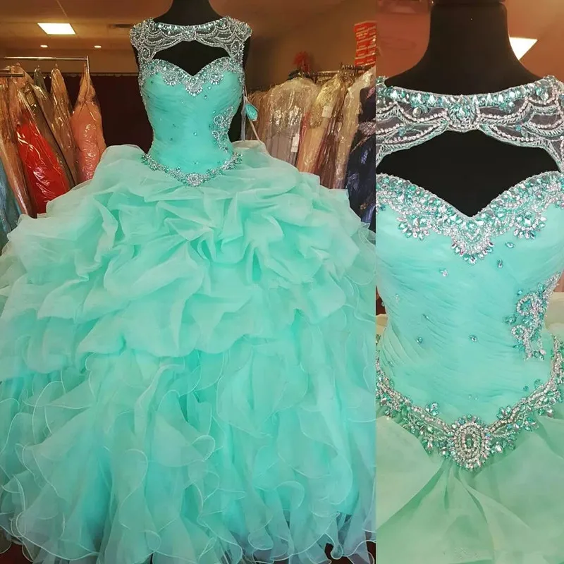 Mint Green Ball Gown Quinceanera Dresses Sweetheart Sheer Beaded Neck Corset Back Ruffles Organza Plus Size Debutante Prom Gowns
Mint Green Ball Gown Quinceanera Dresses Sweetheart Sheer Beaded Neck Corset Back Ruffles Organza Plus Size Debutante Prom Gowns