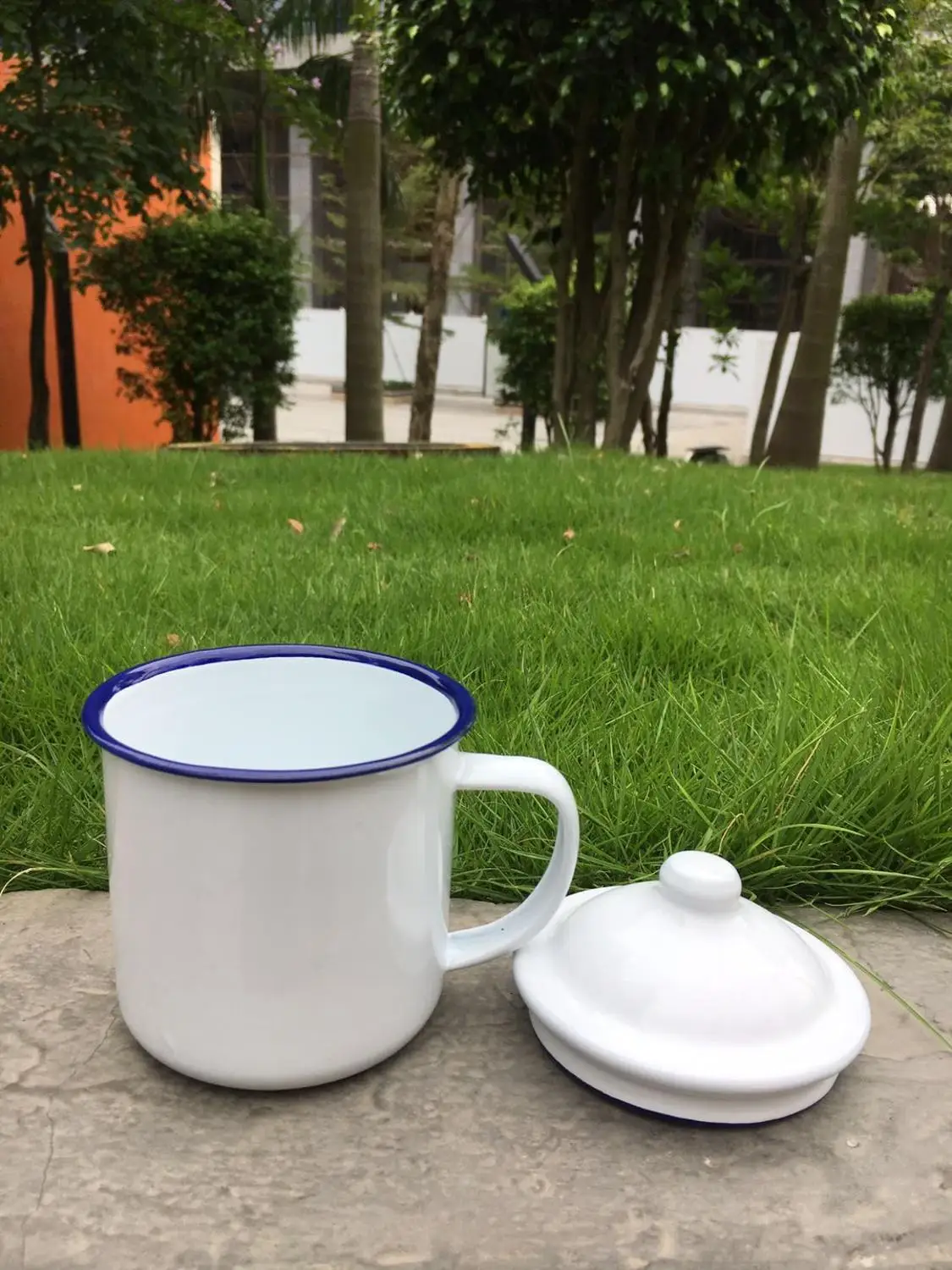 antique good quality 370 ml unbreakable plain white cookable heatable enamel camping mug with lid blue rim on mug and lid
antique good quality 370 ml unbreakable plain white cookable heatable enamel camping mug with lid blue rim on mug and lid