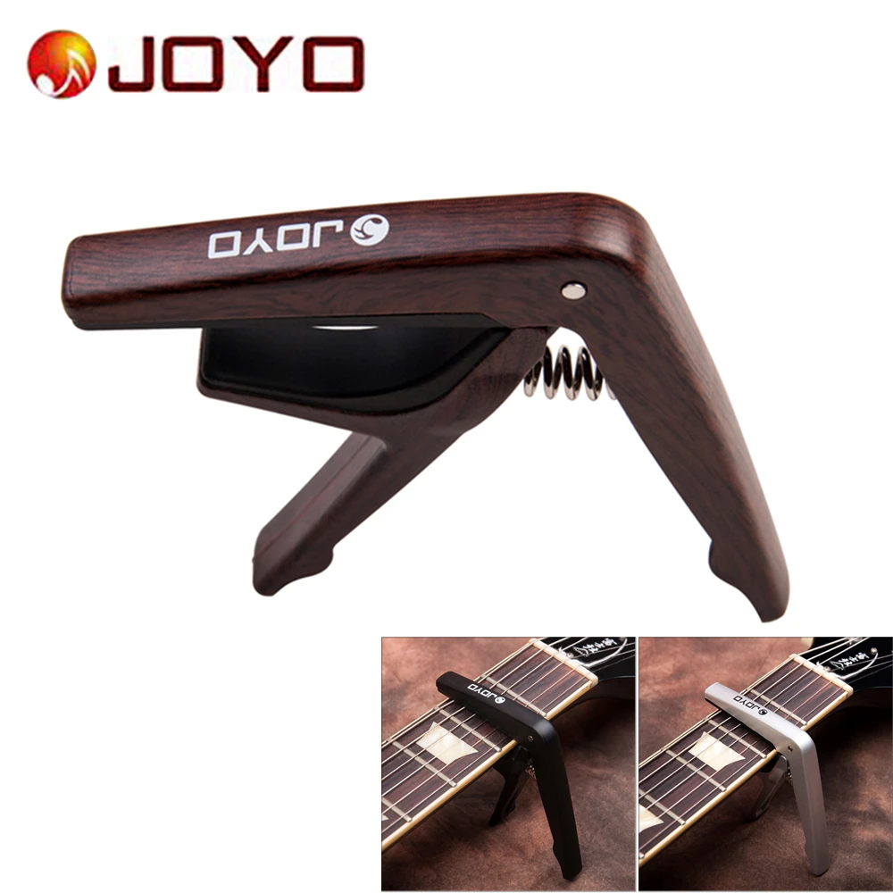 JCP-01 Colorful Sliver / Black / Wood Plastic Guitar Capo for 6 String Guitars with Guitar Picks
JCP-01 Colorful Sliver / Black / Wood Plastic Guitar Capo for 6 String Guitars with Guitar Picks