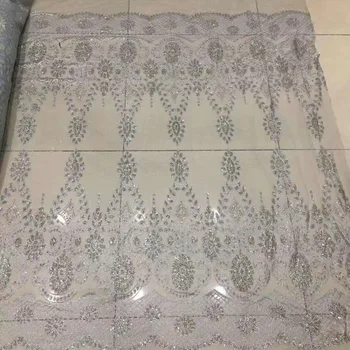 Silver lace fabric high quality french tulle African sequins net lace glitter fabric for S1911612 wedding dress
Silver lace fabric high quality french tulle African sequins net lace glitter fabric for S1911612 wedding dress