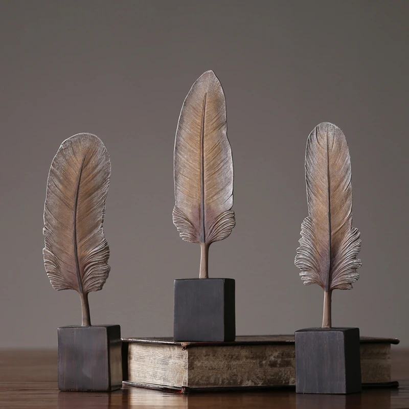 Nordic style feather ornament Creative Resin miniature figurines sitting room Arts and Crafts fashion home decor wedding gifts
Nordic style feather ornament Creative Resin miniature figurines sitting room Arts and Crafts fashion home decor wedding gifts