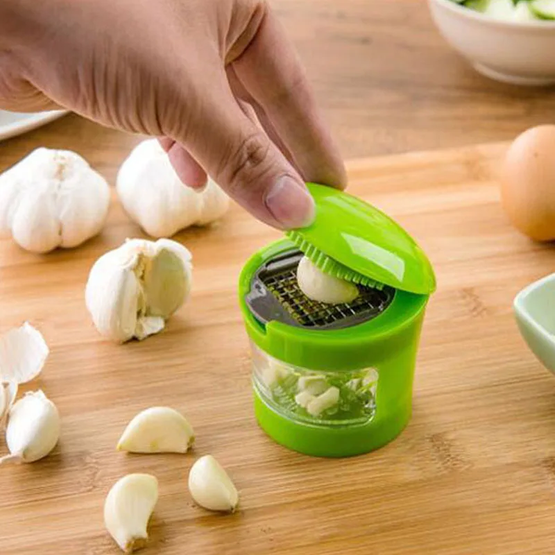 multifunctional Garlic chopper Vegetable Cutter A garlic press Kitchen gadgets Garlic paste making Kitchen tools
multifunctional Garlic chopper Vegetable Cutter A garlic press Kitchen gadgets Garlic paste making Kitchen tools