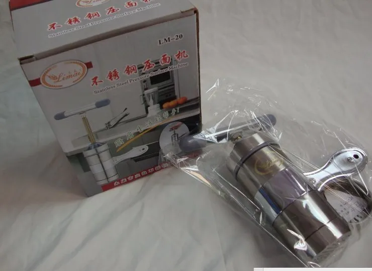 Wholesale Multiple-purpose noodle making machine Manual juicer noodle press Garlic press
Wholesale Multiple-purpose noodle making machine Manual juicer noodle press Garlic press