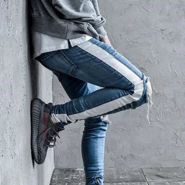 Kanye Distressed Hollow Out Pants Justin Bieber Side Zipper Distressed Jeans White Sides Stripe Blue Denim Skinny Jeans
Kanye Distressed Hollow Out Pants Justin Bieber Side Zipper Distressed Jeans White Sides Stripe Blue Denim Skinny Jeans